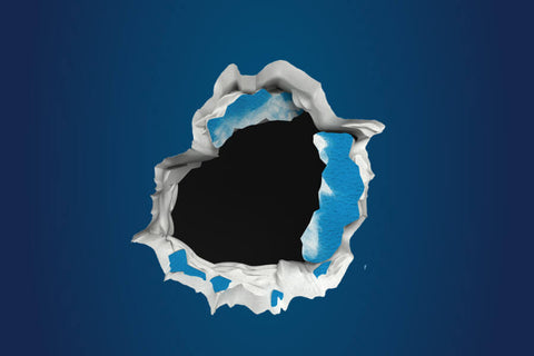 Hole in a blue wall