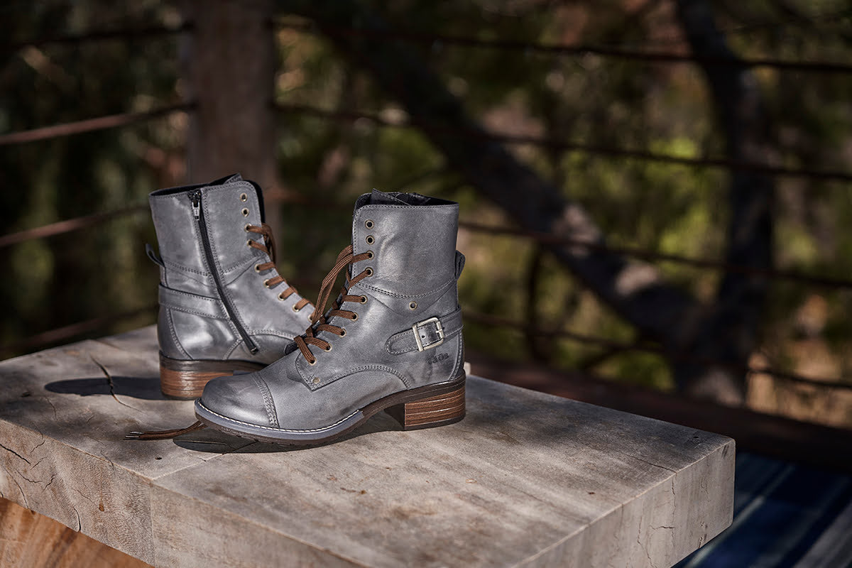 A pair of the Crave by Taos in Steel on a wood bench.