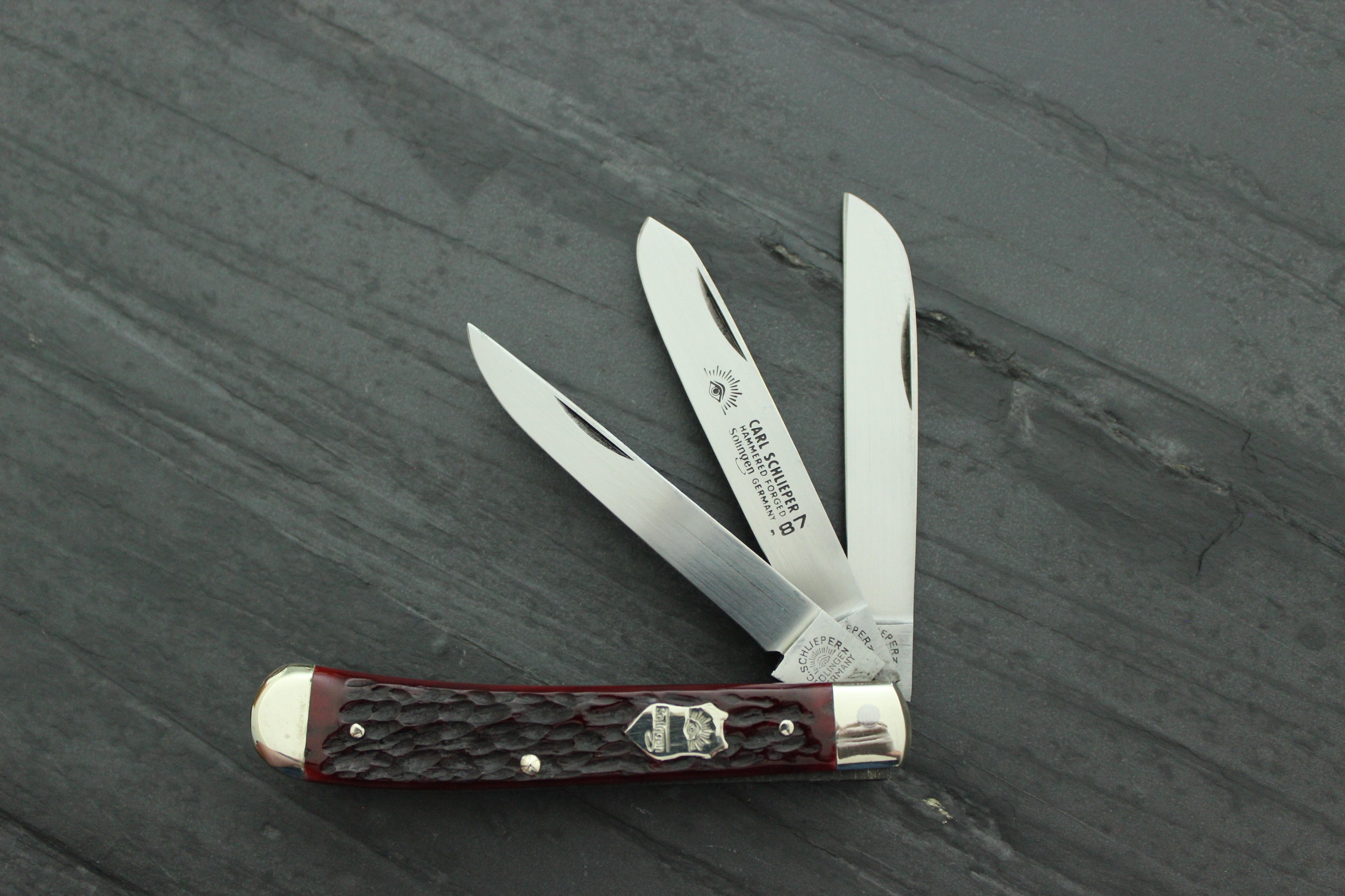 German Eye Brand Trapper 4 Closed, Red Bone Handles - KnifeCenter - GEJR -  Discontinued