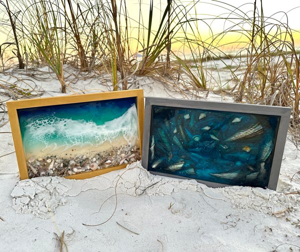 Two pieces of frame epoxy resin art with an ocean-theme.