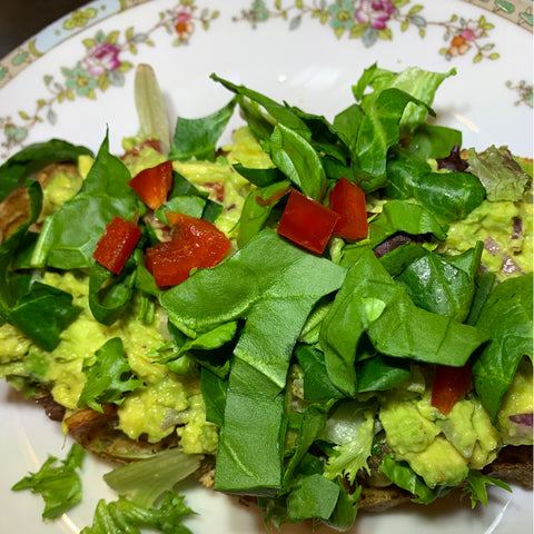 avocado toast with baby arugula, tapenade and balsamic