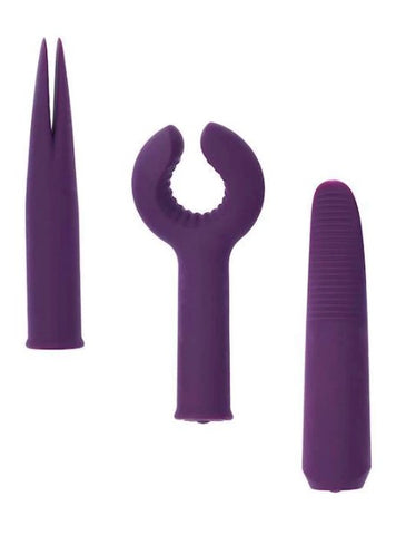 Three deep purple items that look rubbery lay beside each other. The two on either end look like wands, one with a rounded tip the other pointed. The item in the centre resembles a grabby hand with a rounded end that look like fingers trying to make the letter O together.