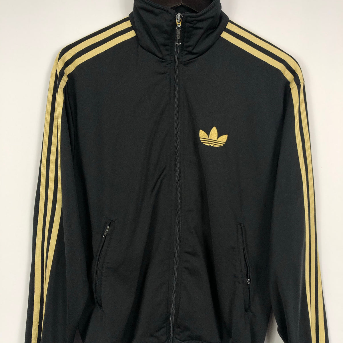 black and gold adidas track jacket