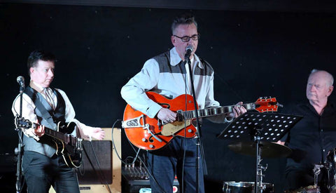 Richard Hawley performs with Adrian McKenna (left) and John Firminger (right) 