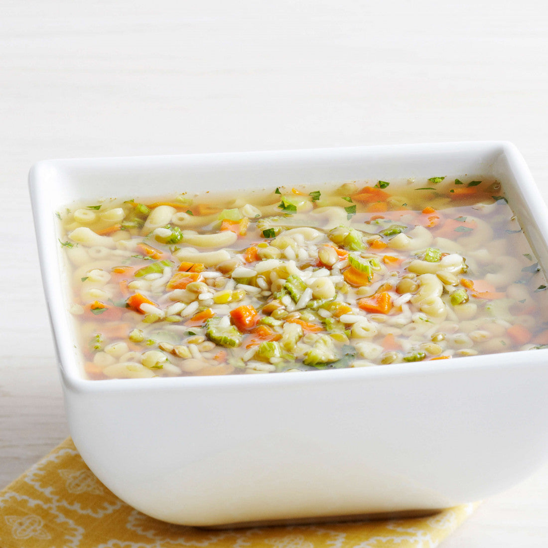 This hearty and homey soup has it all! Packed with nutrition and great flavor, our Chicken-Flavored Vegetable Soup is a soup-er (we had to) comforting take on a total classic