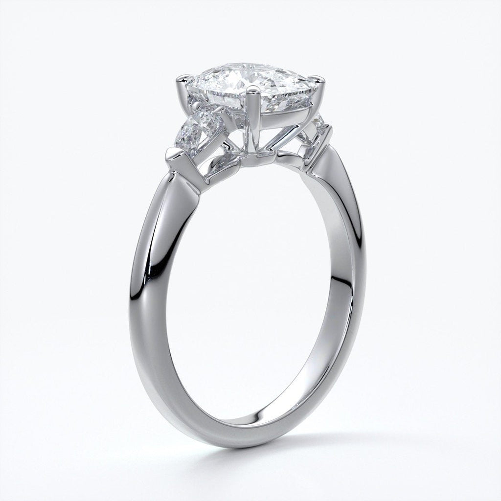 Sophie Engagement ring cushion cut trilogy pears cathedral platinum