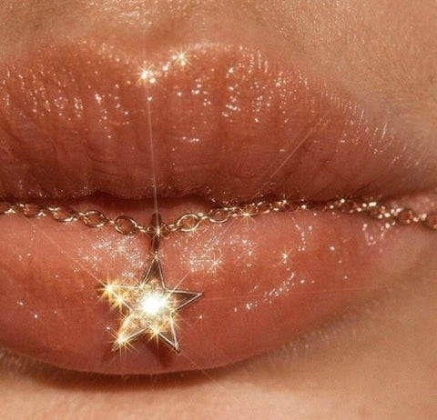 Picture of lips with a gold star 