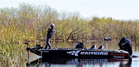 Bass Pro Brent Chapman pulls bass out of heavy cover with KastKing fishing rod. 