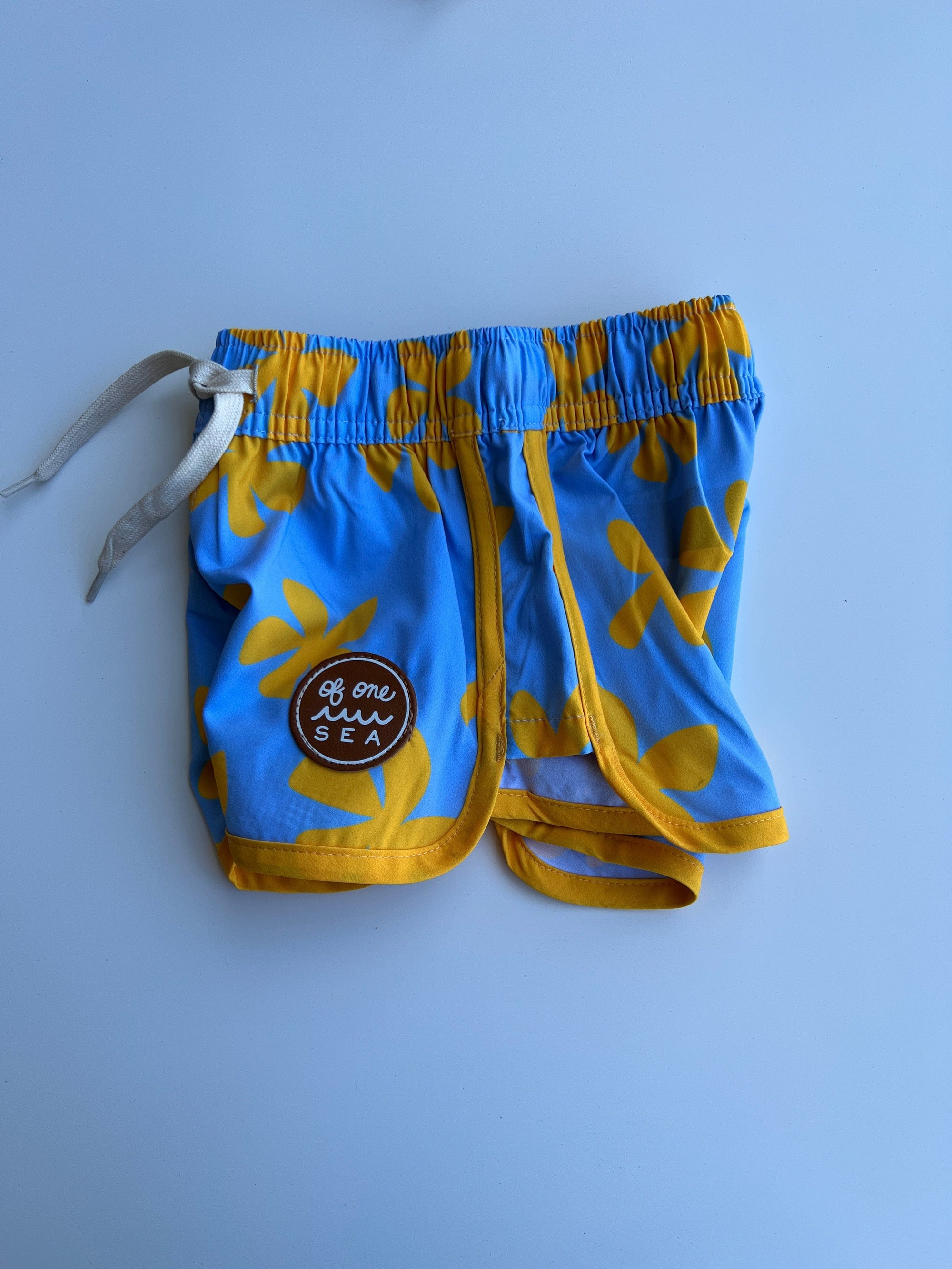 Toddler Soft Shorts for Swim in Yellow Ohia Lehua Print - OF ONE SEA