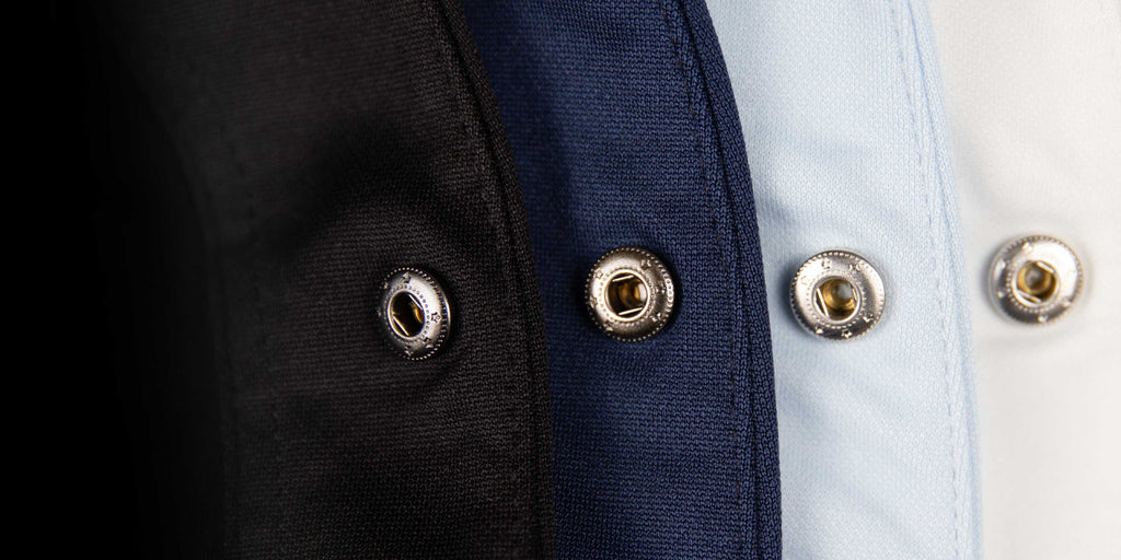 Close up of the Cheegs 2.0 Collarless Dress Shirt metal snap buttons