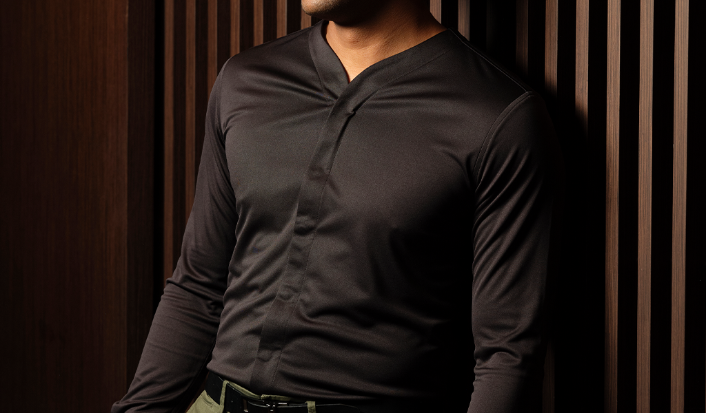 Man wearing a Cheegs collarless dress shirt 2.0 Long Sleeve in Black
