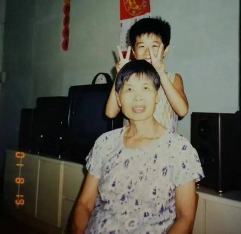 Yushan as a child with her grandmother