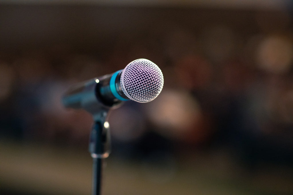 microphone whistling used to illustrate why hearing aids whistle and how to stop it