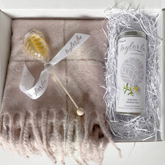 Taylor Lee Comfort_Warm and cozy comfort kit with blush and camel colored scarf, tea, and clover honey tea stir