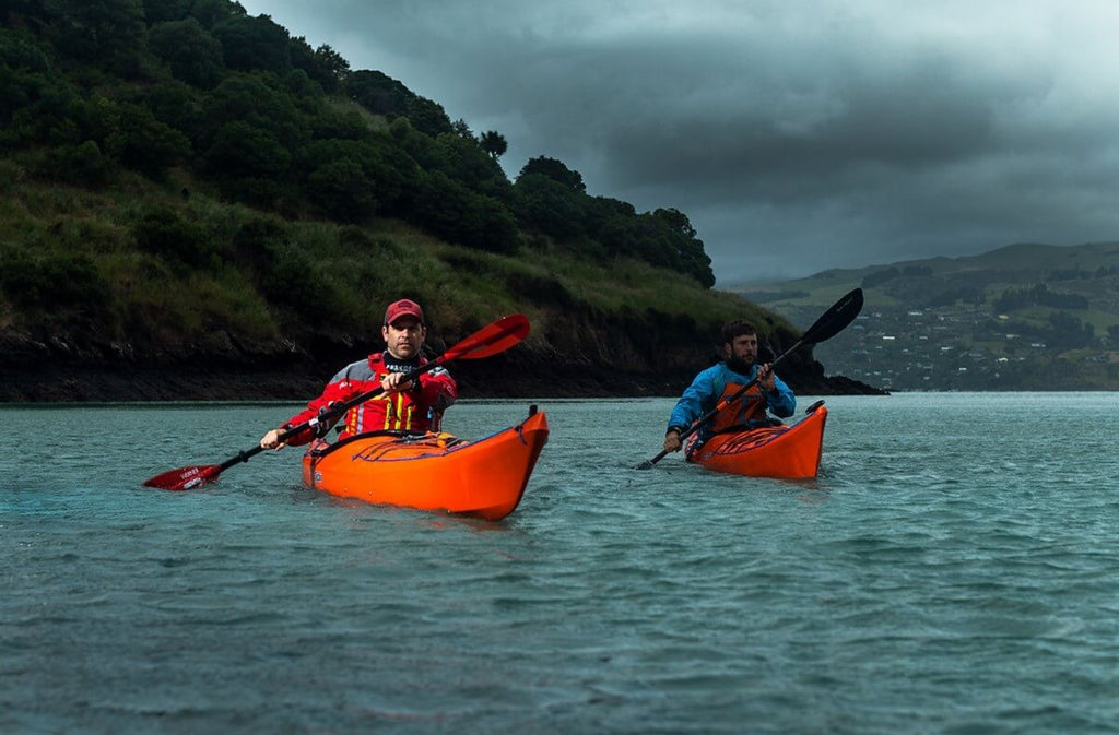 two men sea kayaking in Christchurch