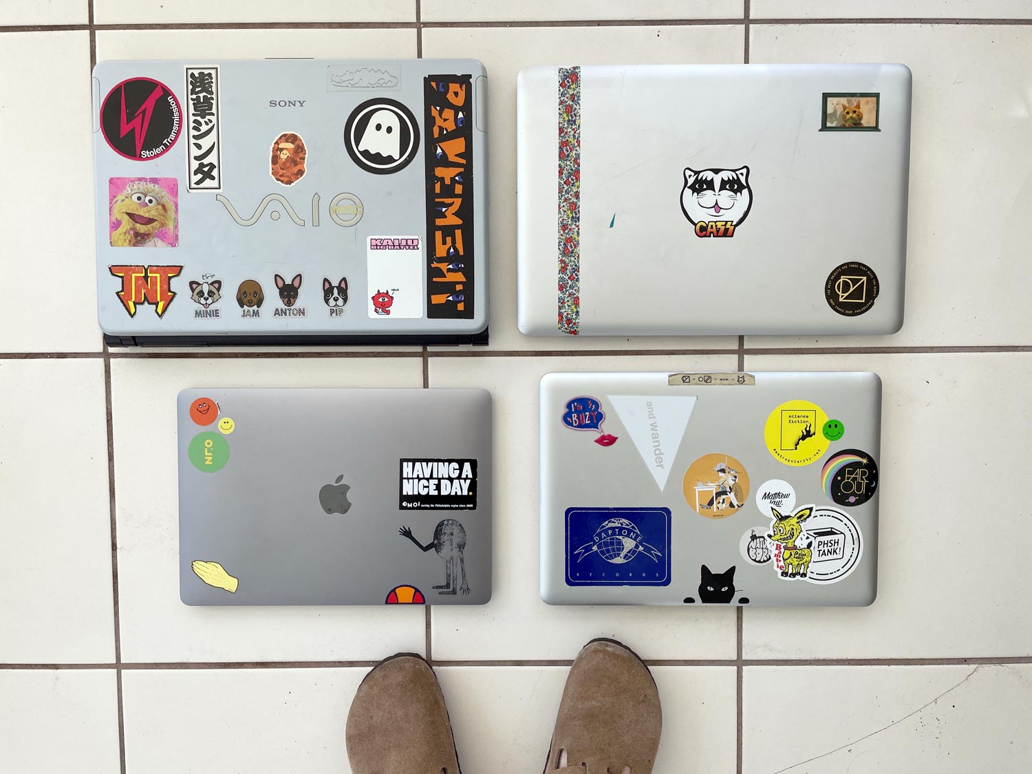 Which of Liz's laptop stickers do you remember seeing when you came by for a visit?