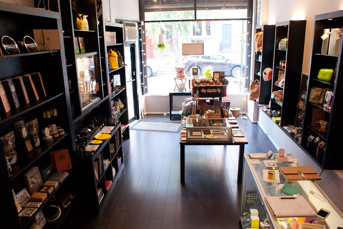 The store in late August. We don't have anything in the window hardly, and the whole shop feels incredibly pared down. 