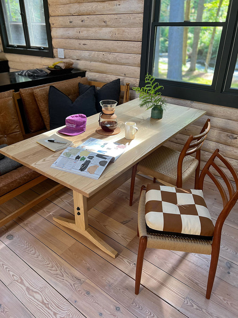 The FROEBEL cushion making the kitchen table chair more comfy