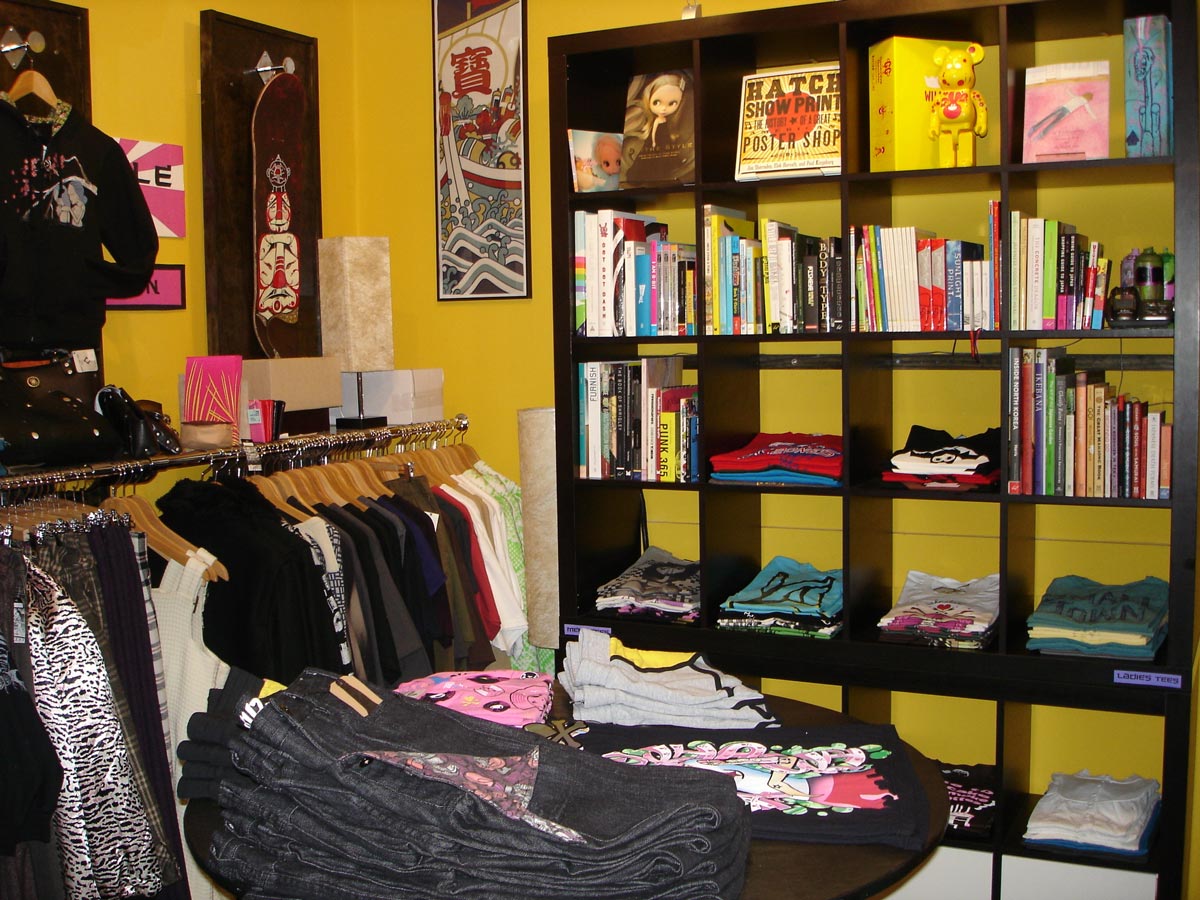 The back room in 2008 full of raw denim, graphic tees, and books.