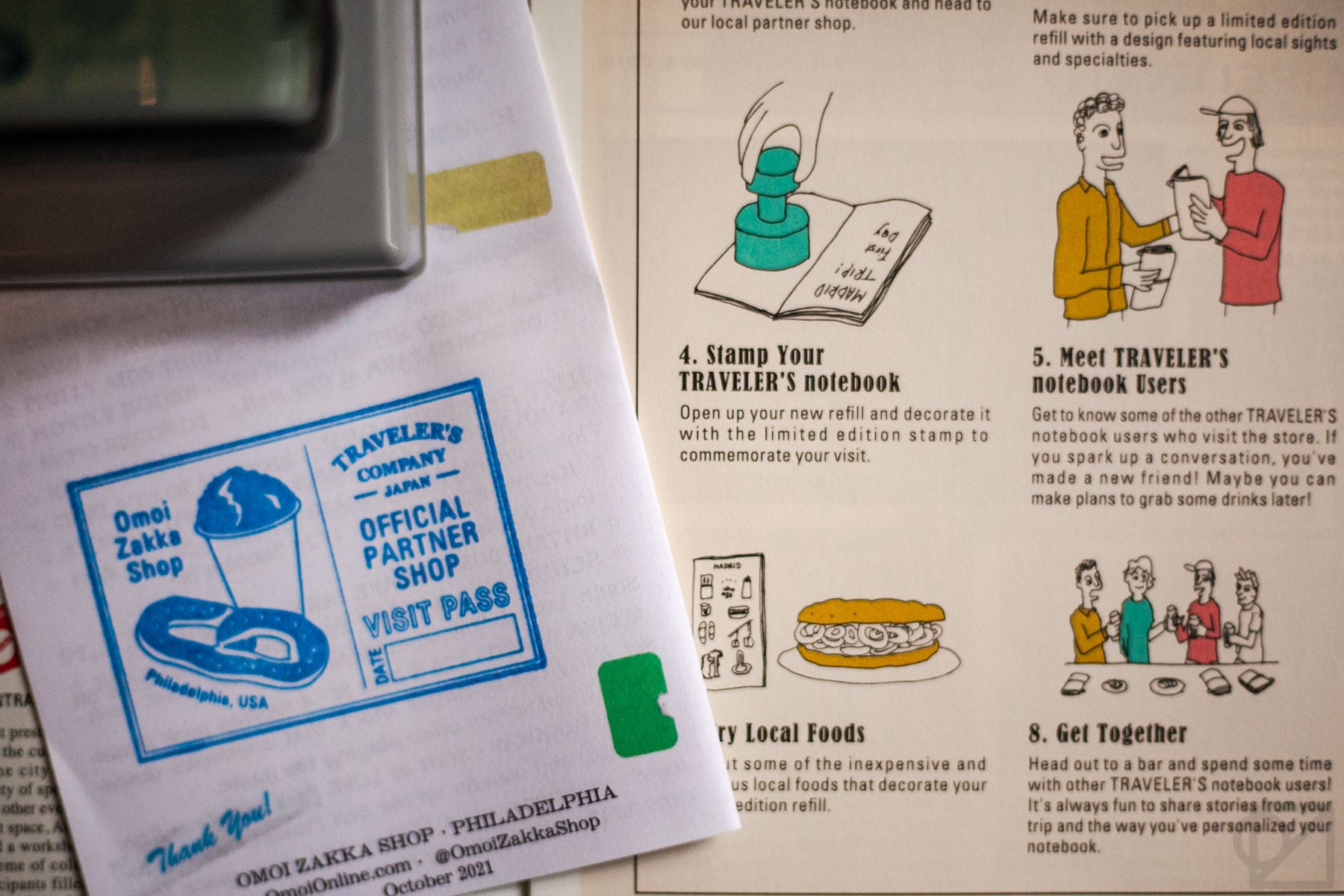 The store stamp next to the section of the latest TRAVELER'S TIMES instructing visitors to use the store stamp!