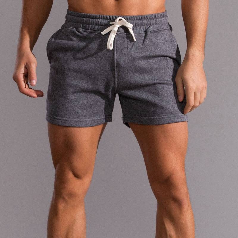 Men's casual sport fitness shorts in lightweight and comfort fit style with oversized zip hoodie and big watch accessories for streetwear fashion3