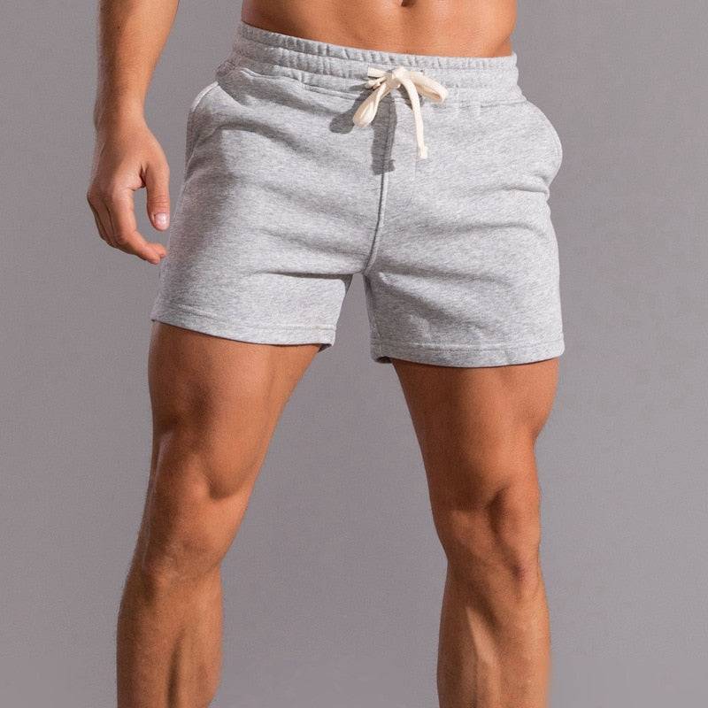 Men's casual sport fitness shorts in lightweight and comfort fit style with oversized zip hoodie and big watch accessories for streetwear fashion2