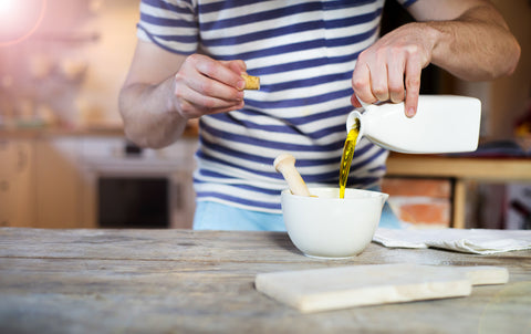 cook prepares vinaigrette 