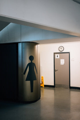 door-to-a-womens-bathroom Sliding Doors For Interior Doors