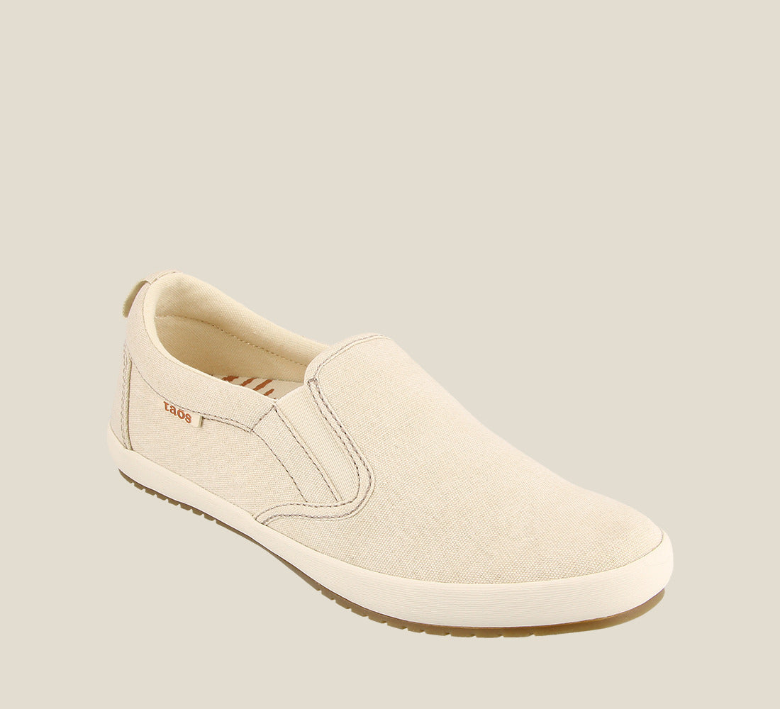 3/4 Angle of Dandy Beige Wash Canvas slip on active sneaker featuring twin gore and rubber outsole - size 6