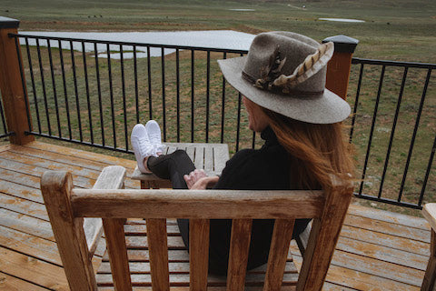 woman resting wearing her sneakers