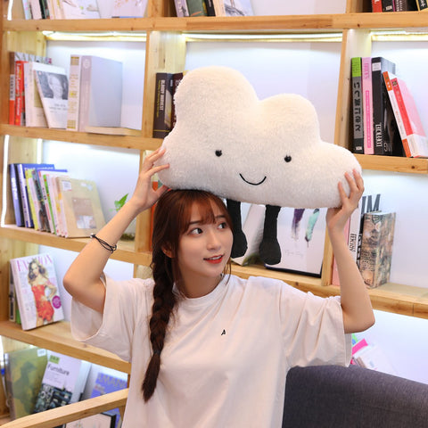 girl holding cloud plush