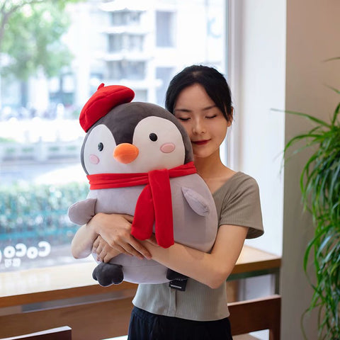 hugging penguin plush