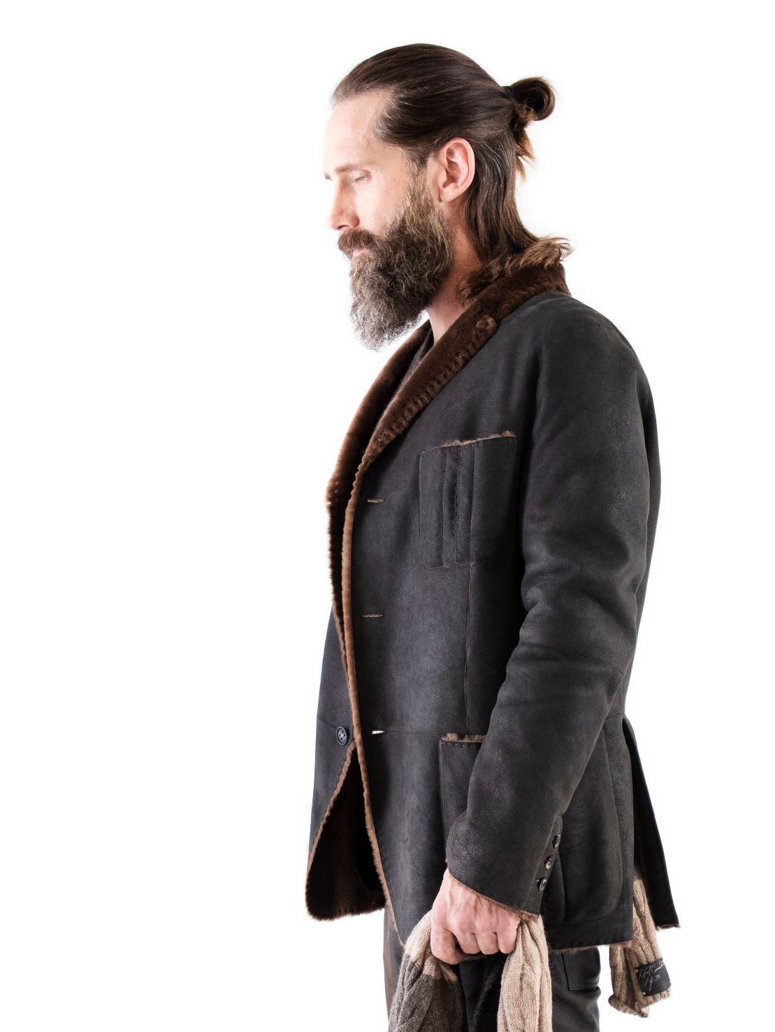 Silhouette of Spanish Lancon featherweight shearling with horn buttons, raw cut seams and patch pockets