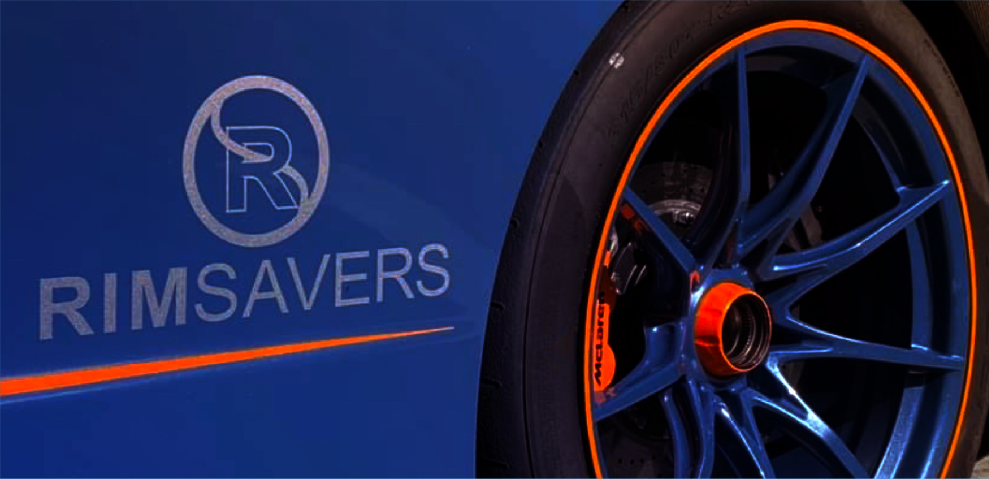 Close-up of Rimsavers Alloy Wheel Rim Protectors Orange Set,