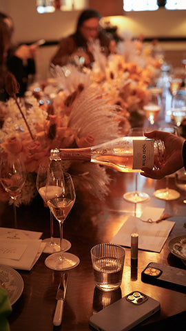 Glasses of Wild Idol Alcohol Free Sparkling Rosé Wine being poured at the 20 Berkeley Wild Idol event