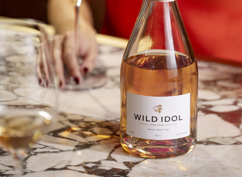 A bottle of Wild Idol Alcohol-Free Sparkling Rosé Wine