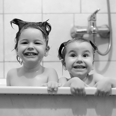 siblings bathing together