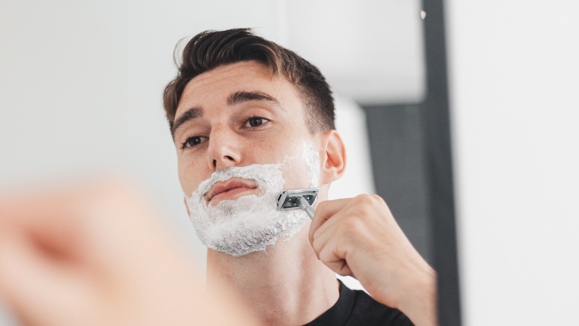 Man shaving his face with BOVEM Align Razor