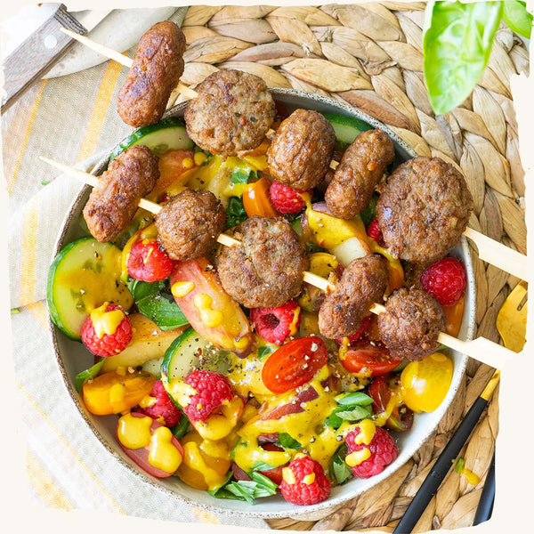 Summer salad with fruit and vegan meatballs