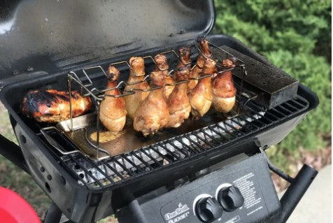 BBQ Grill and Smoker with a rack of Chicken Thighs