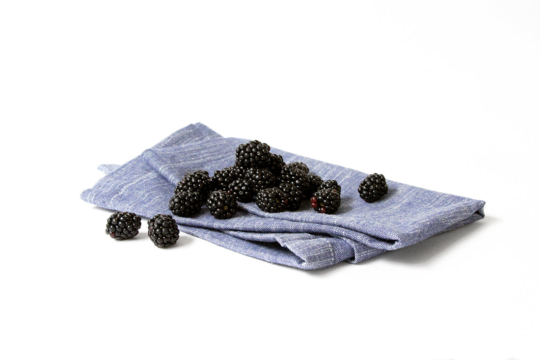 Image of blackberries on a towel used for Miss Jones Baking Co Blackberry Buttermilk Donuts