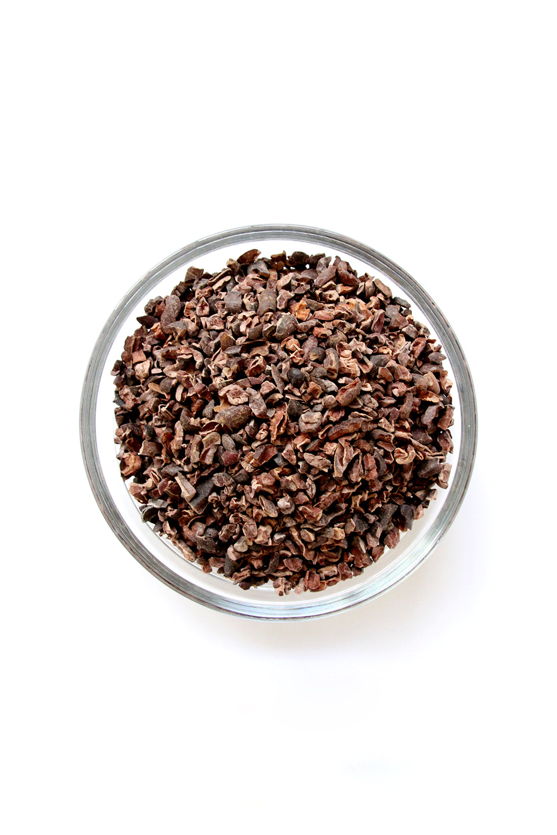 Image from above of a bowl of cacao nibs used for Miss Jones Baking Co Coffee Break Shake