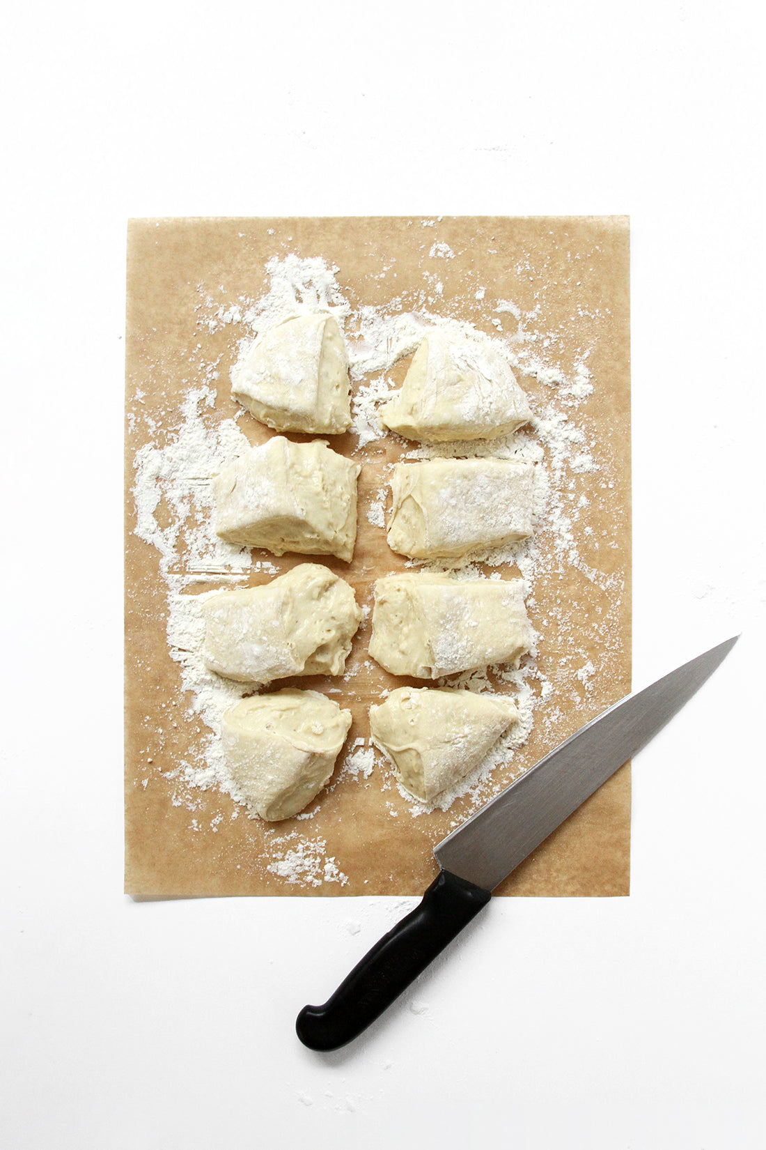 Image of eight pieces of dough for Miss Jones Baking Co Cake Mix Dinner Rolls 