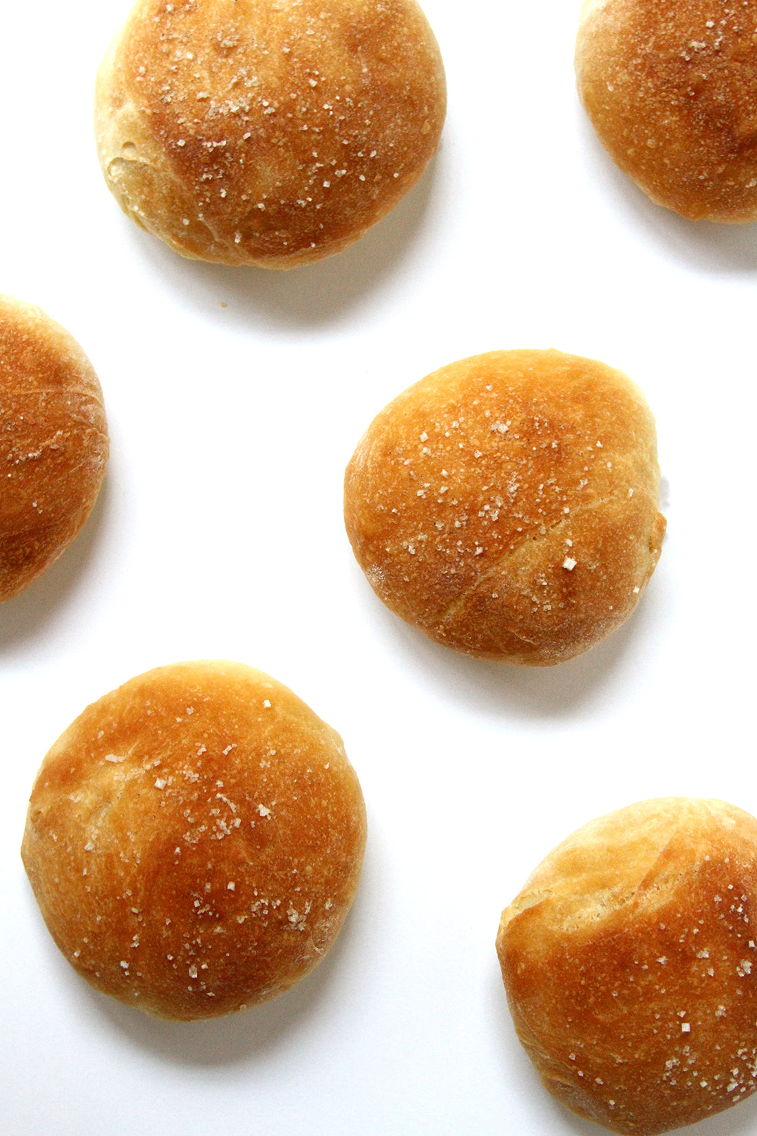 Close up image of six Miss Jones Baking Co Cake Mix Dinner Rolls