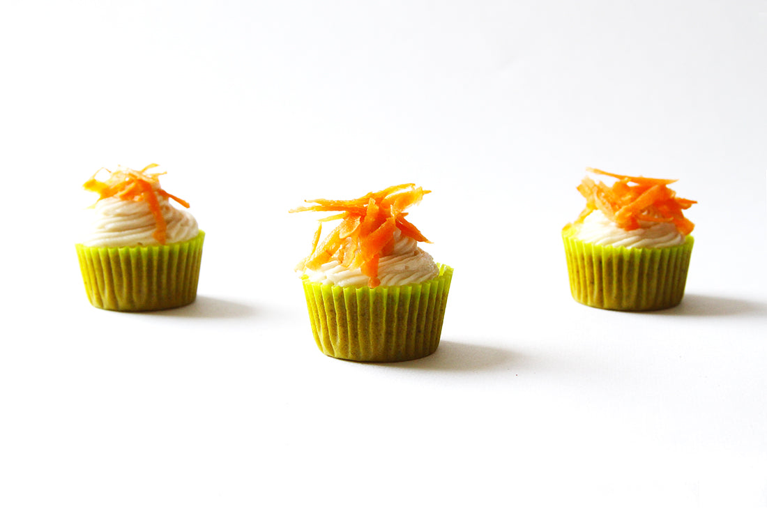 Image of three Miss Jones Baking Co Carrot Spice Cakes topped with shredded carrots