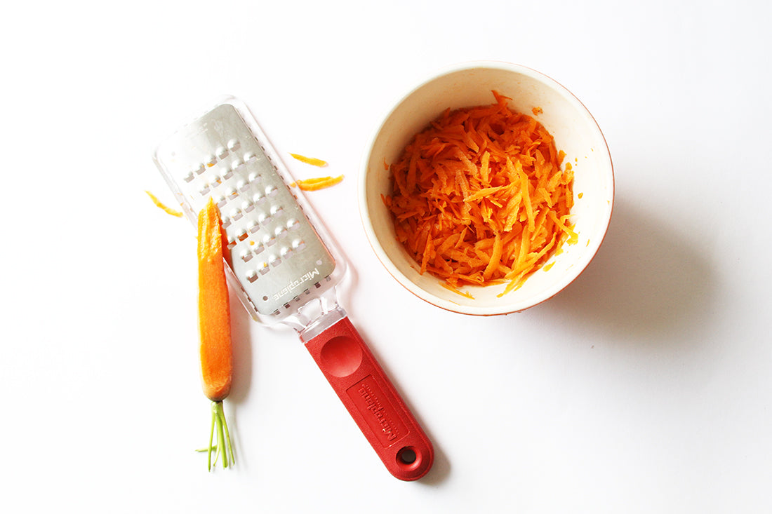 Image of a bowl of shredded carrots used for Miss Jones Baking Co Carrot Spice Cake Recipe