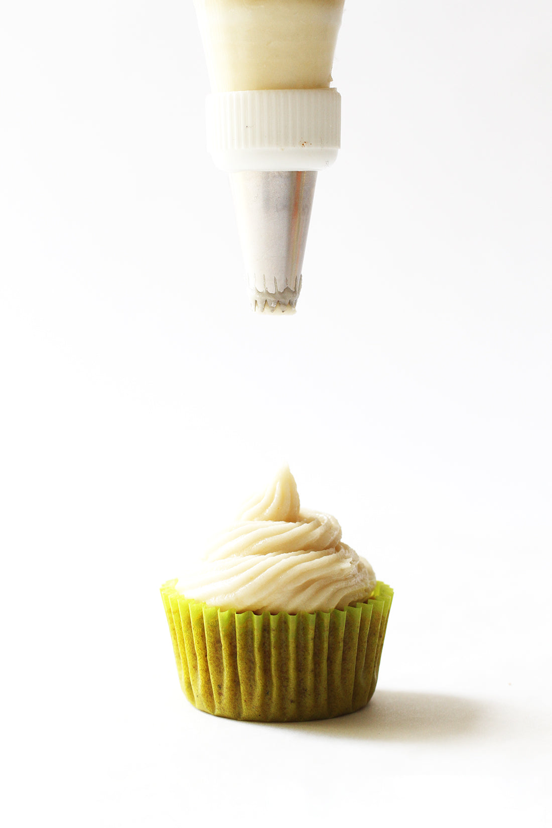 Image of a Miss Jones Baking Co Carrot Spice Cake being frosted