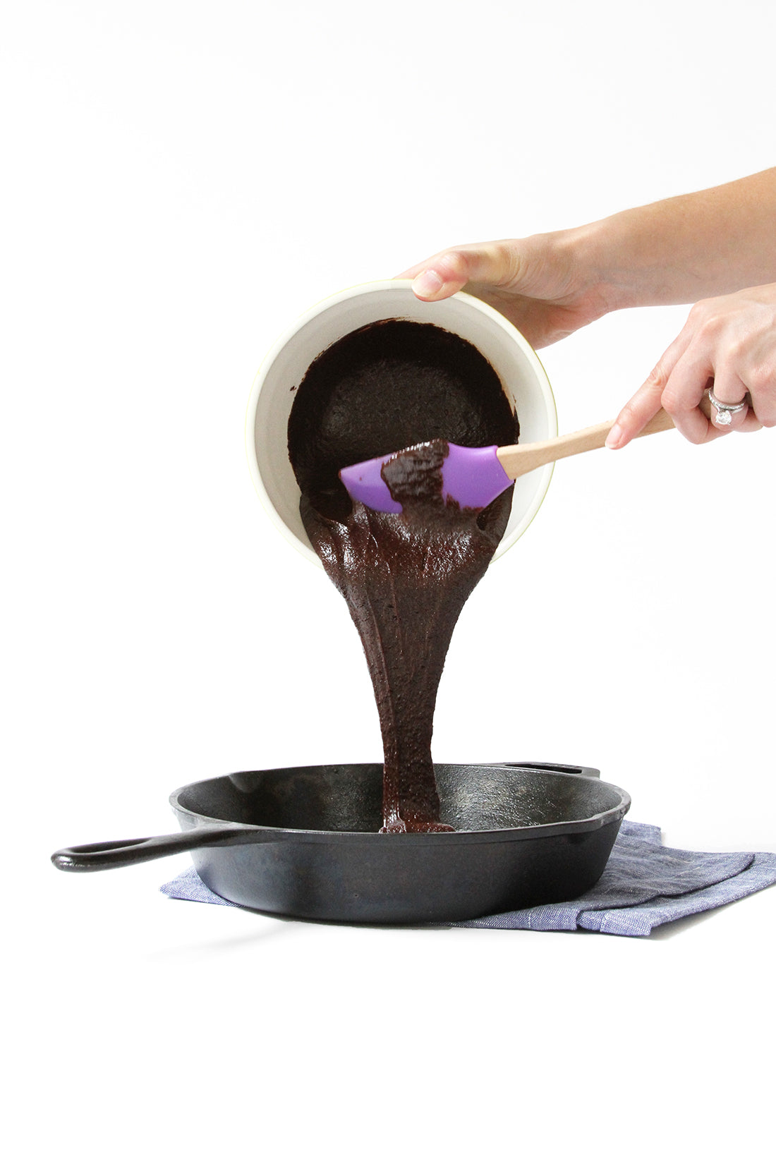 Brownie batter being poured into a skillet for Miss Jones Baking Co Chocolate Chip Brownie Skillet