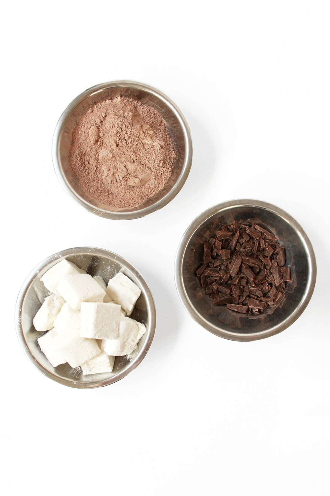 Image of three bowls of ingredients for Miss Jones Baking Co Hot Cocoa Mug Cake recipe