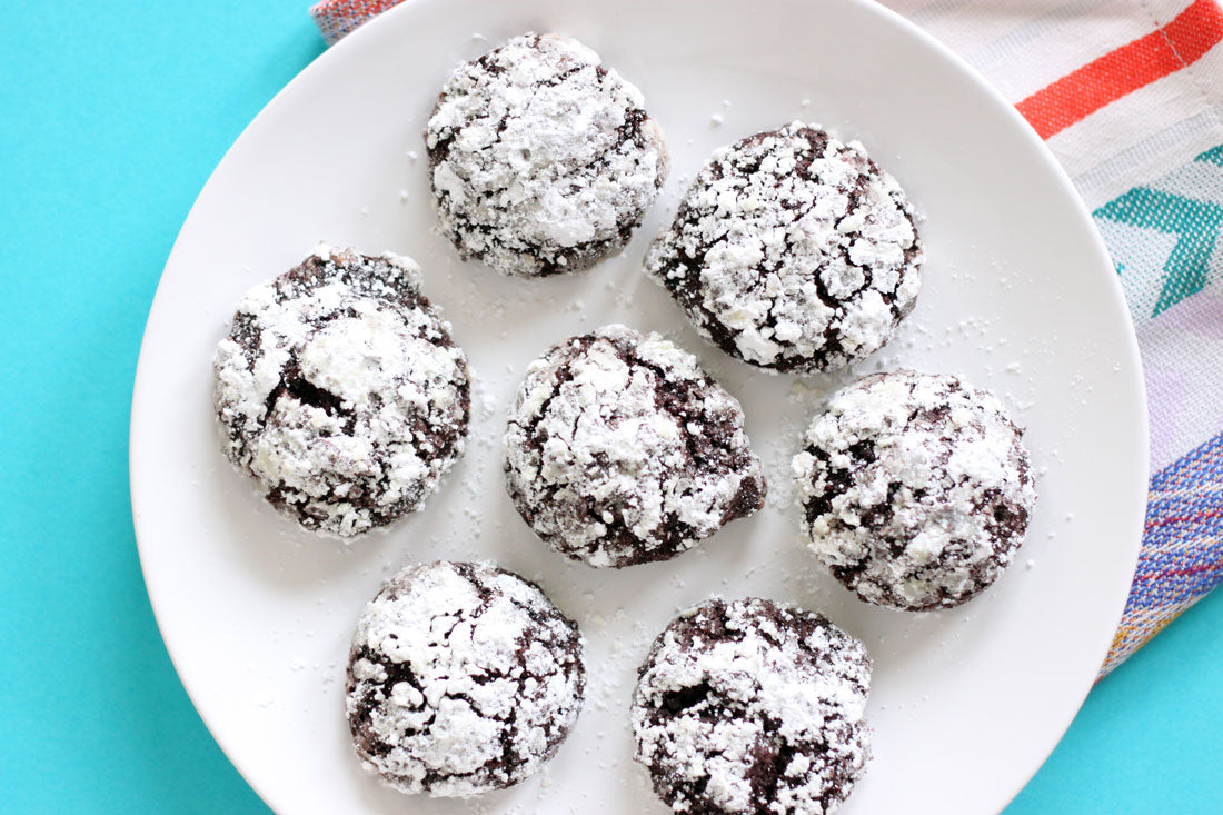 Seven Miss Jones Baking Co Chocolate Cake Mix Crinkle Cookies on a white plate